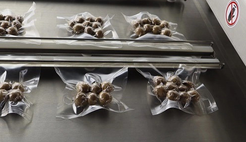 220V/380V Automatic Rolling Belt Type Continuous Vacuum Packaging Machine for Food